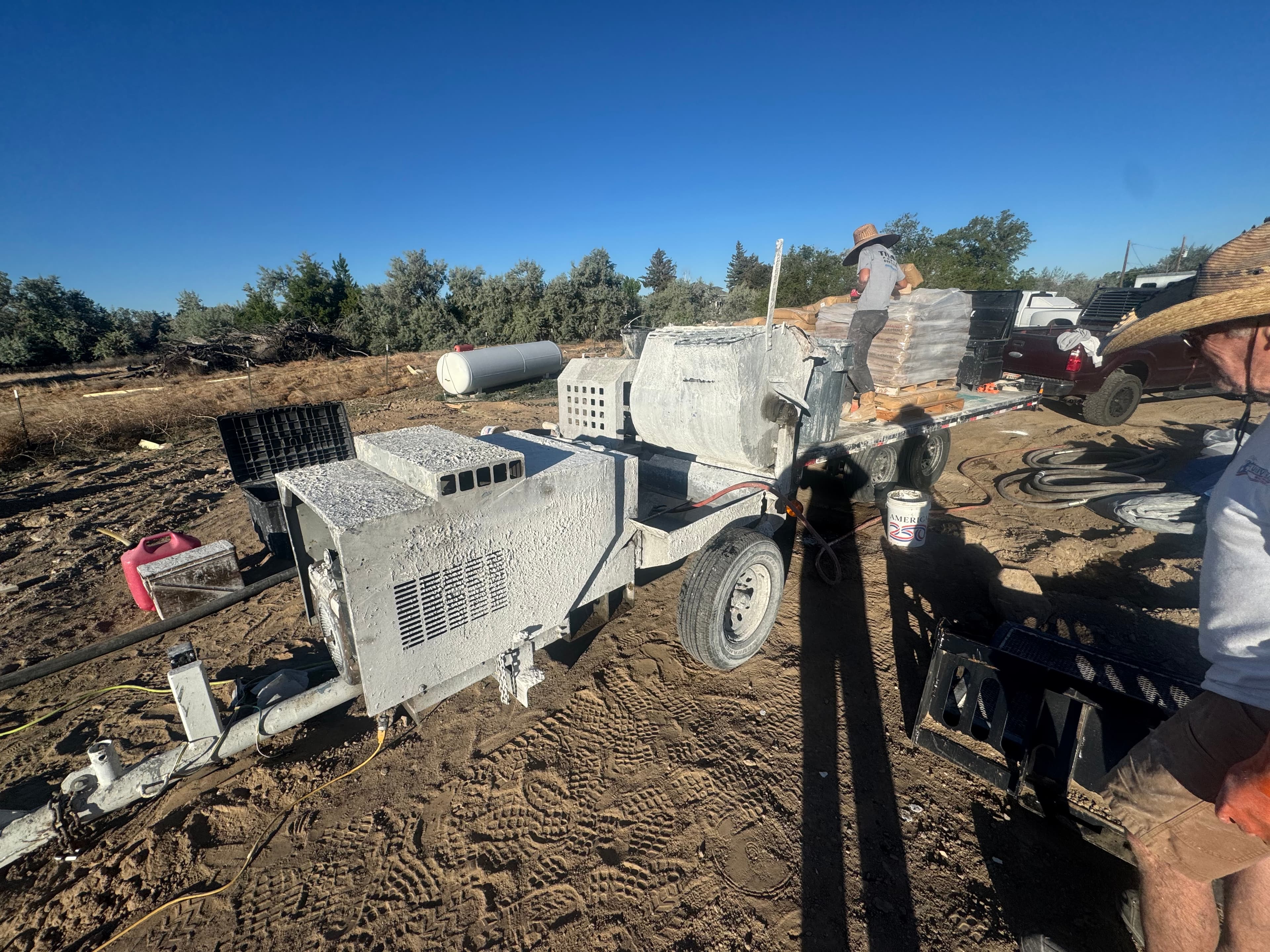 Farnsworth Pool Co. plaster mixing equipment on job site